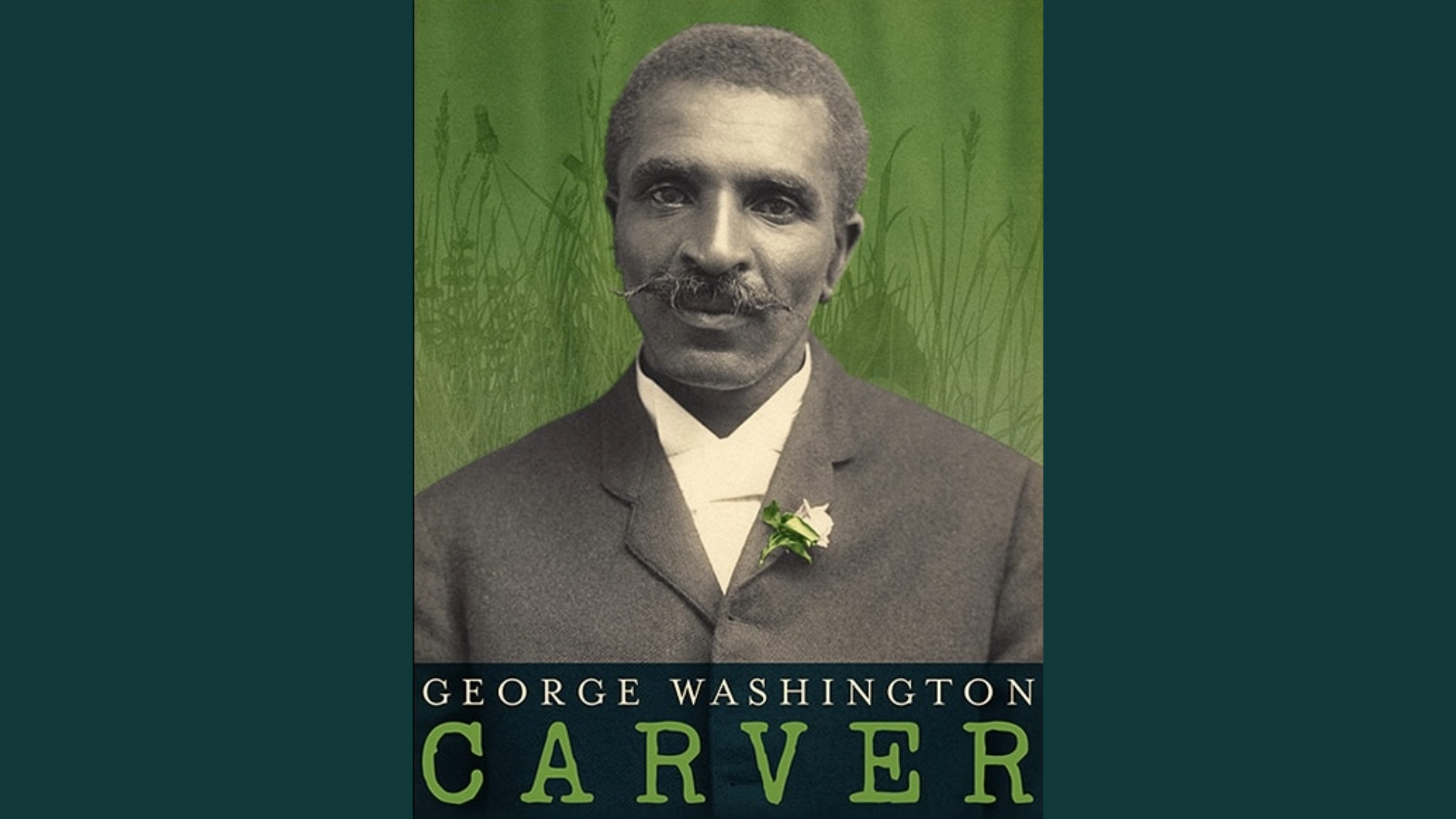 Photo of George Washingtion Carver wearing a suit jacket with a flower pinned to the lapel